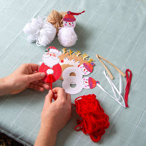 Make Your Own Christmas Pom Pom Decorations